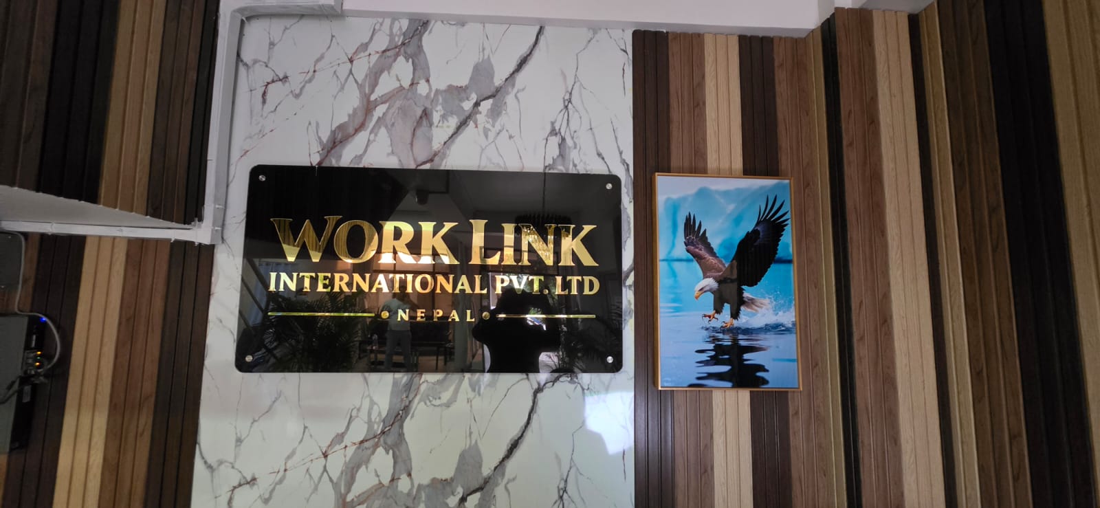 Work Link International engraved wall sign inside the office